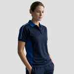 Model wearing the Orn Avocet Poloshirt in Navy / Royal