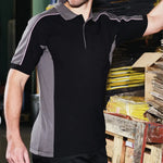Model wearing the Orn Avocet Poloshirt 1188 in Black / Graphite