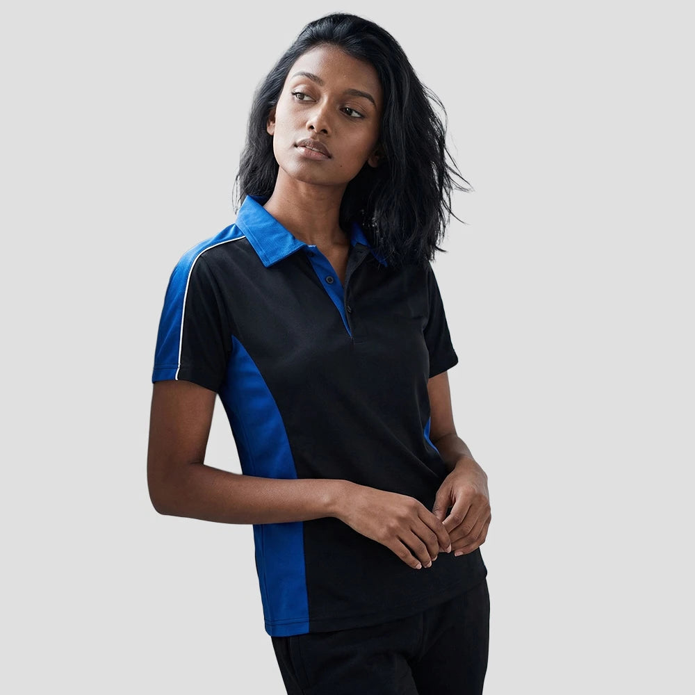 Female model wearing the Orn Avocet Wicking Polo Shirt 1198 in Black / Royal