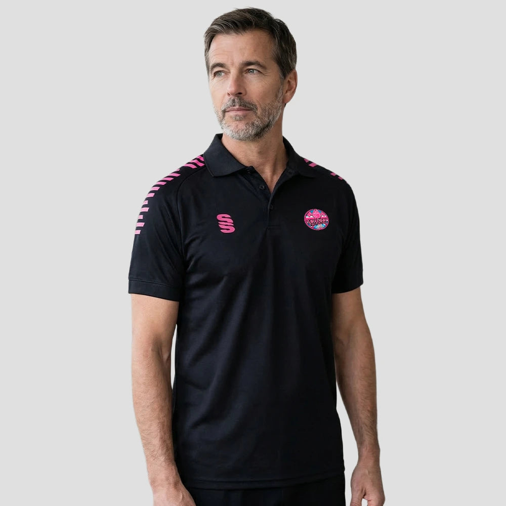 Model wearing the Pink Fire Brigade Polo Shirt