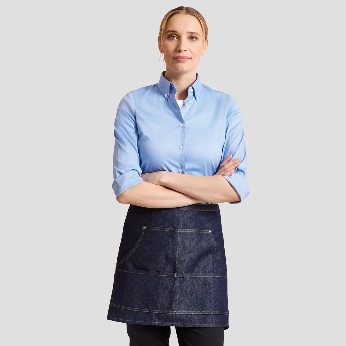Model wearing the Premier Denim Waist Apron PR125.