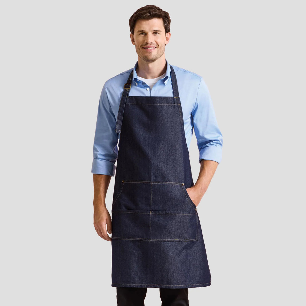 Model wearing the Premier Denim Bib Apron PR126.