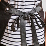 Back view of model wearing the Premier Domain Bib Apron PR127.