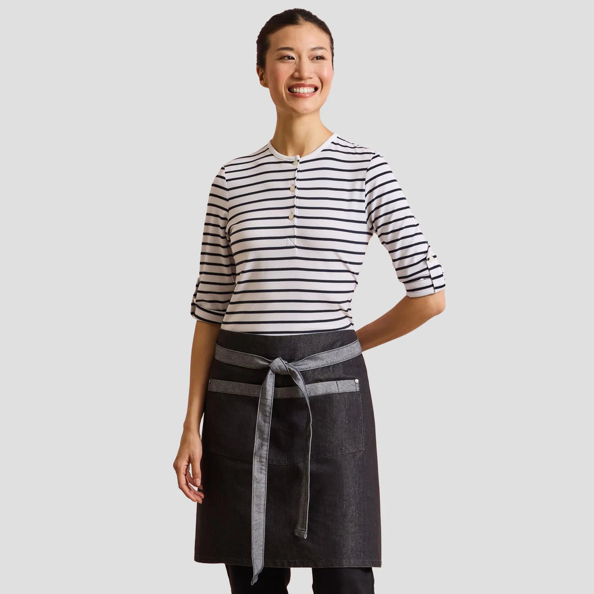 Model wearing the Premier Domain Waist Apron PR128.