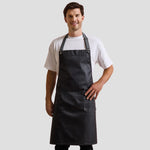 Model wearing the Premier District Bib Apron PR134.