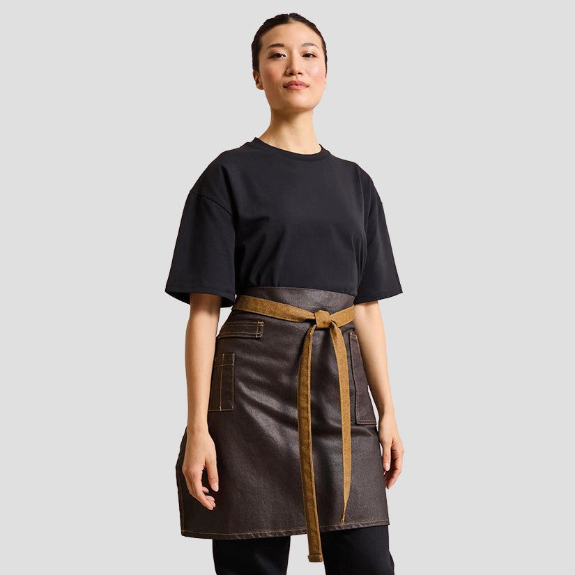 Model wearing the Premier Division Waist Apron PR135.