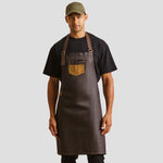 Model wearing the Premier Division Bib Apron PR136.