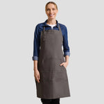 Model wearing the Premier Calibre Heavy Canvas Pocket Apron PR137.