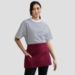 Model wearing the Premier 'Colours' 2-in-1 Apron PR159.