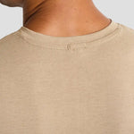 Back neck close-up of model wearing the Premier Cotton Rich Comis T-Shirt PR219.