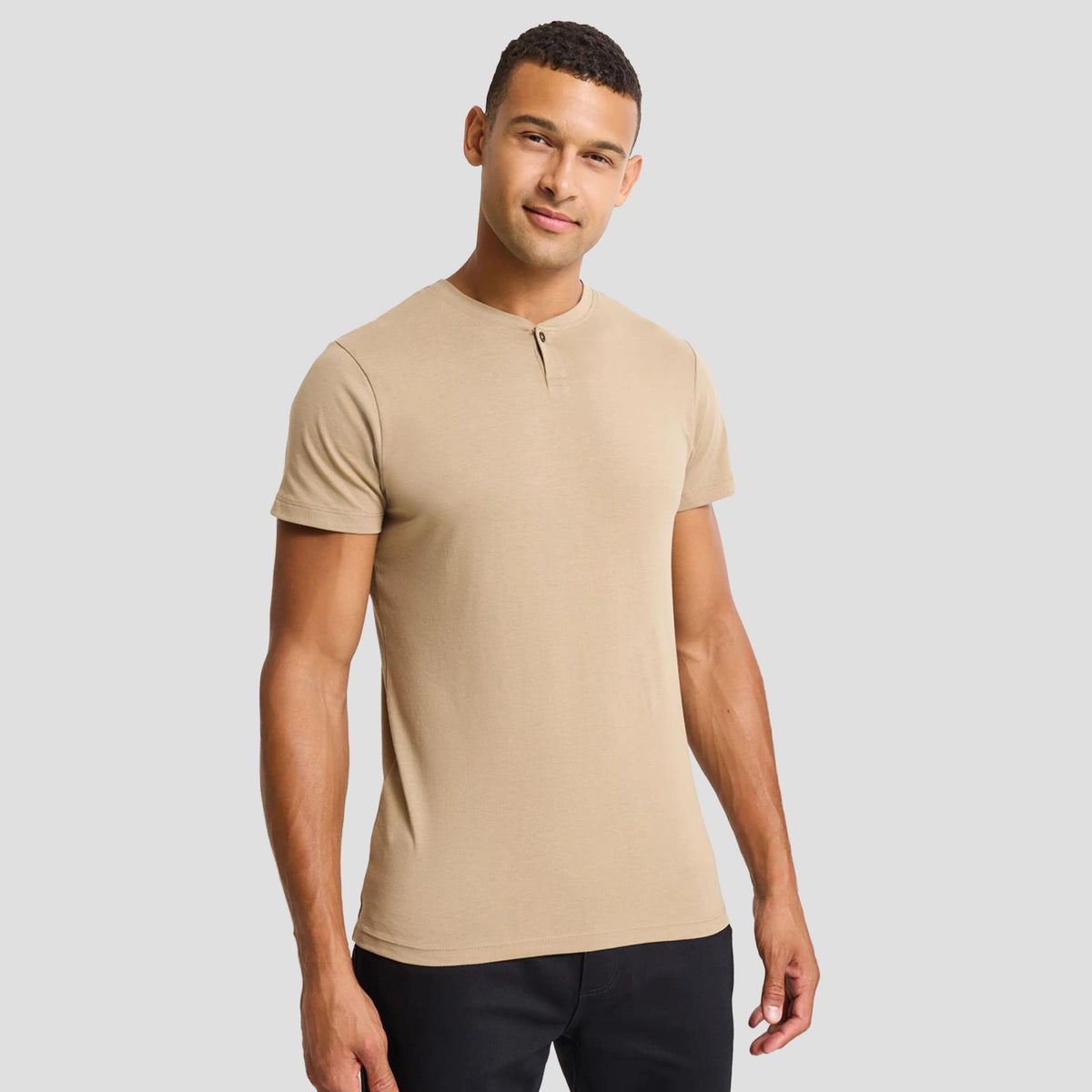 Model wearing the Premier Cotton Rich Comis T-Shirt PR219.
