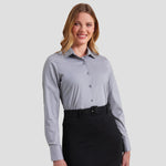 Model wearing the Premier Ladies Long Sleeve Stretch Fit Poplin Shirt PR344 (tucked in).