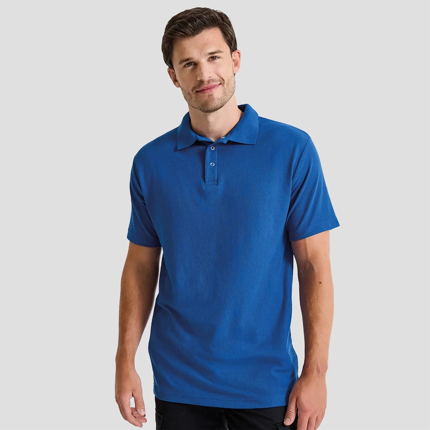 Model wearing the Premier Stud Piqué Polo Shirt PR610