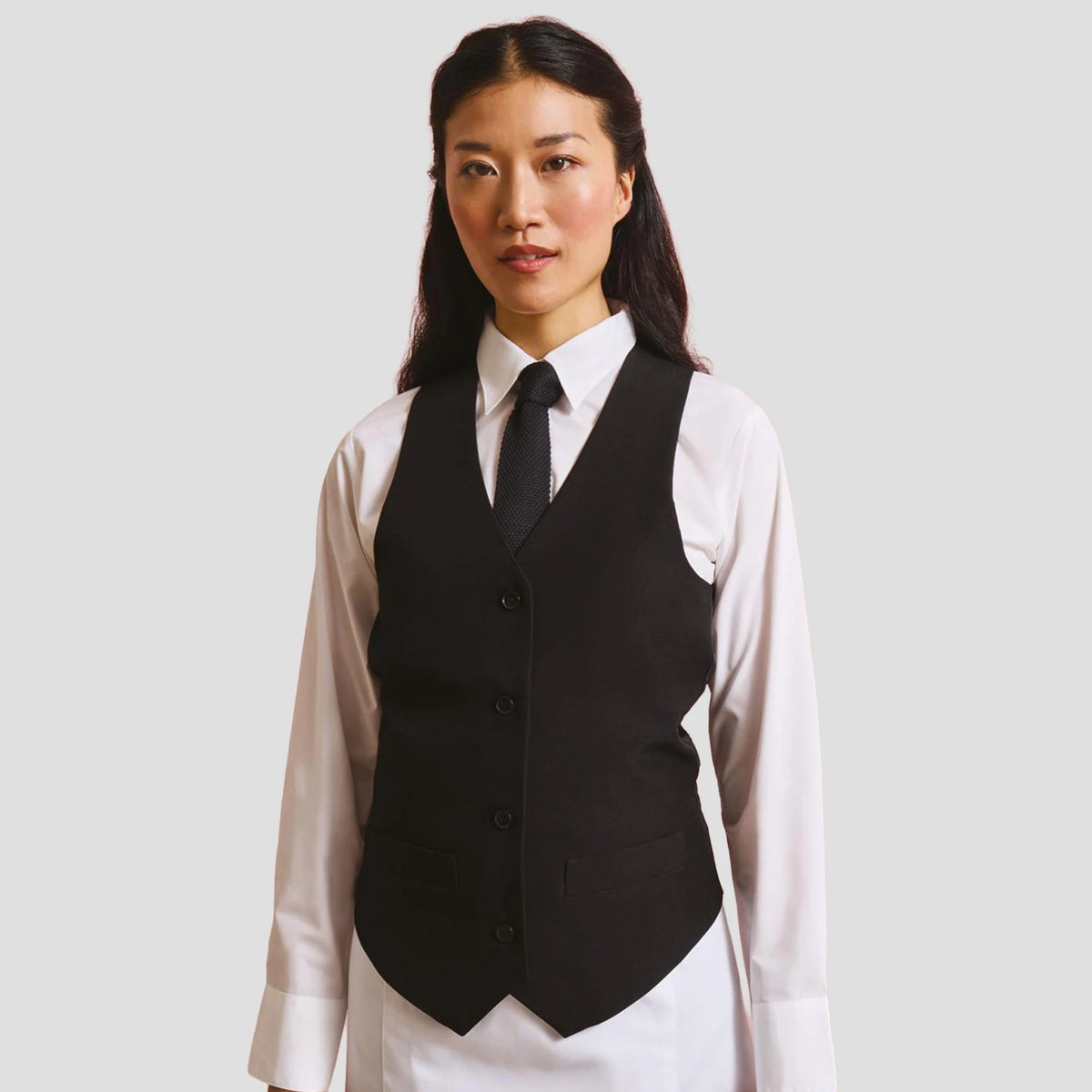 Model wearing the Premier Ladies Lined Waistcoat PR623.