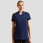 Model wearing the Premier Ladies Blossom Short Sleeve Tunic PR683 in Navy.