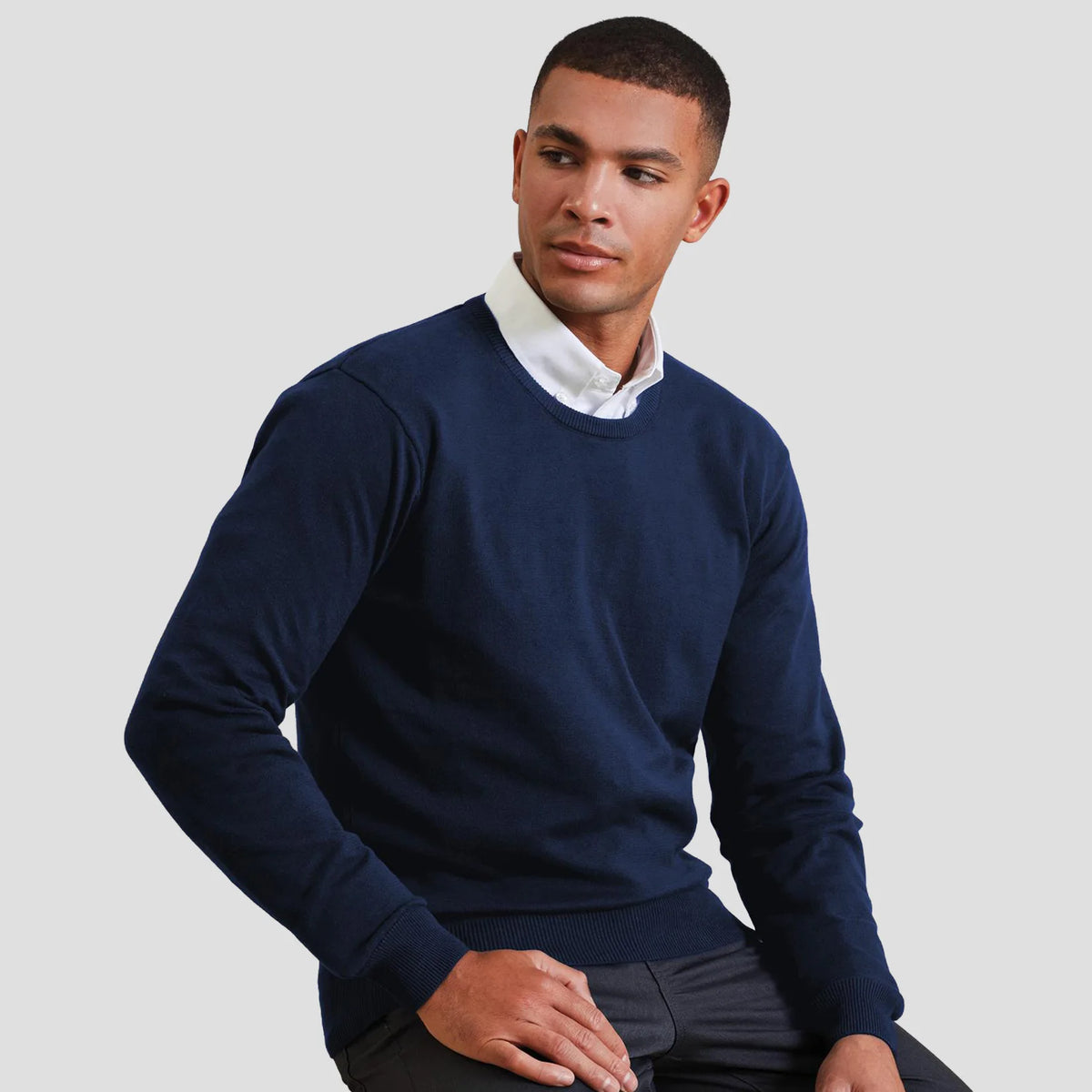 Model wearing the Premier Cotton Rich Crew Neck Sweater PR692.