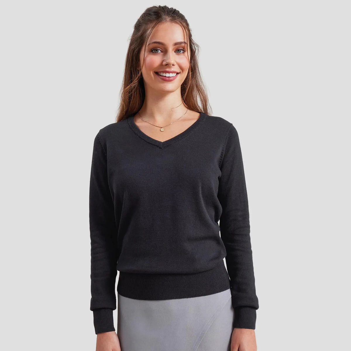 Model wearing the Premier Ladies Knitted Cotton Acrylic V Neck Sweater PR696.