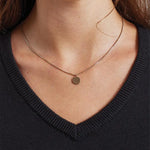 Front close-up of model wearing the Premier Ladies Knitted Cotton Acrylic V Neck Sweater PR696.