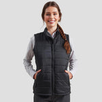 Model wearing the Premier Ladies Recyclight® Padded Gilet in Black.
