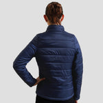 Back view of model wearing the Premier Ladies Recyclight® Padded Jacket.