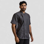 model wearing Premier Short Sleeve Zipped Chef's Jacket