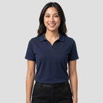 Model wearing the Portwest - Organic Cotton Recyclable Polo Shirt EC210 in Navy