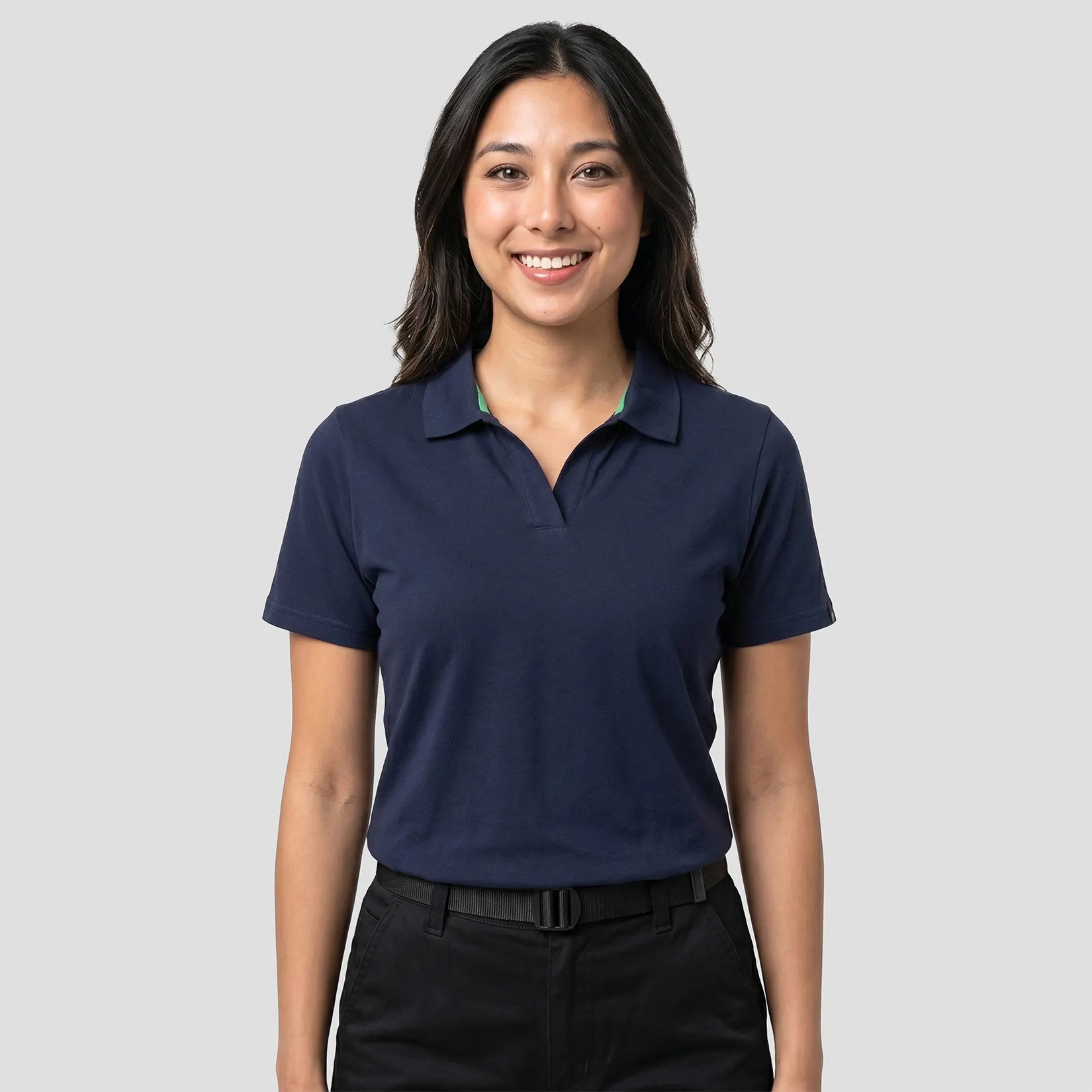 Model wearing the Portwest - Organic Cotton Recyclable Polo Shirt EC210 in Navy