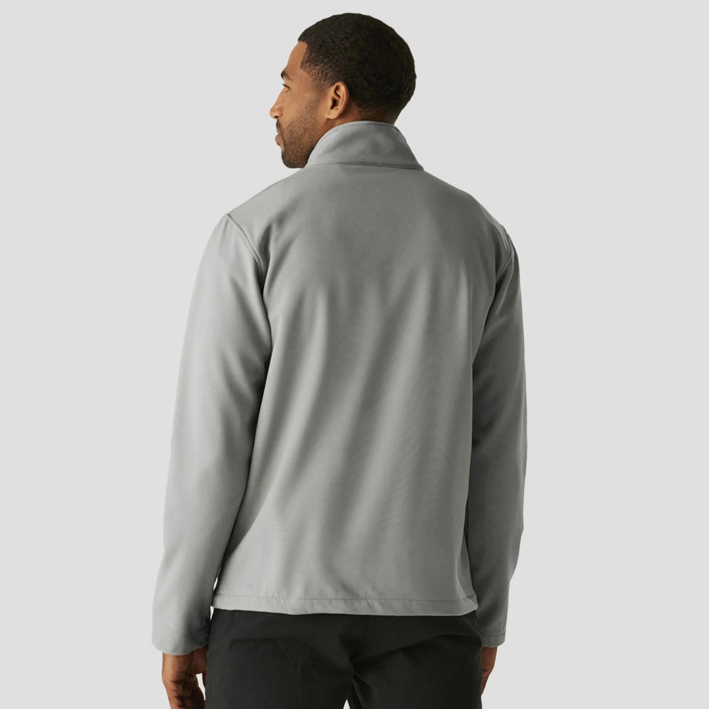 Rear view of Model wearing the RG371 Regatta Ascender Two Layer Soft Shell Jacket in Mineral Grey