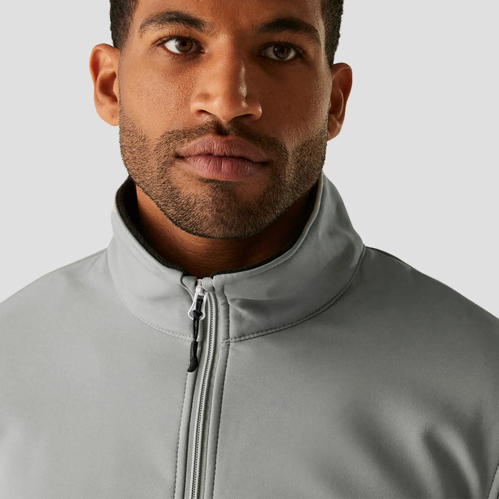 Close-up of Model wearing the RG371 Regatta Ascender Two Layer Soft Shell Jacket in Mineral Grey