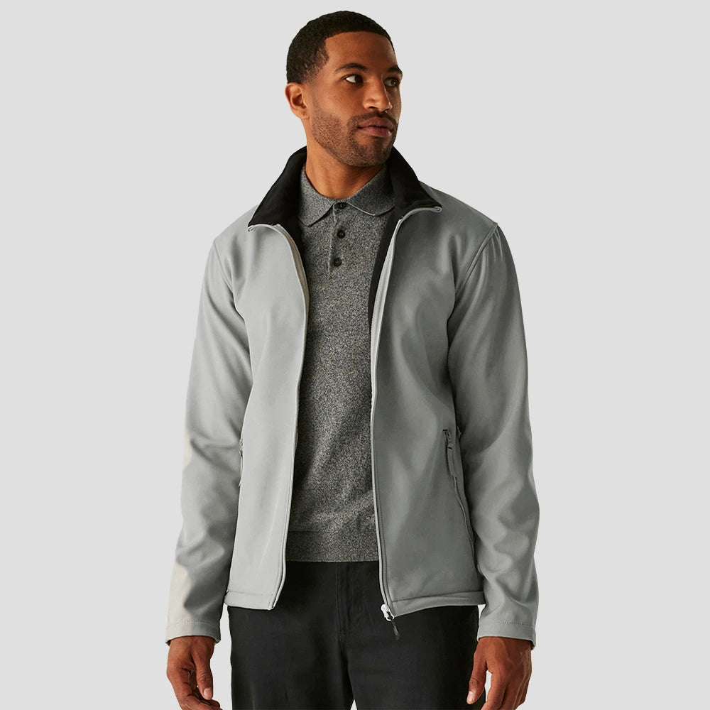 Model wearing the RG371 Regatta Ascender Two Layer Soft Shell Jacket in Mineral Grey in a casual fashion
