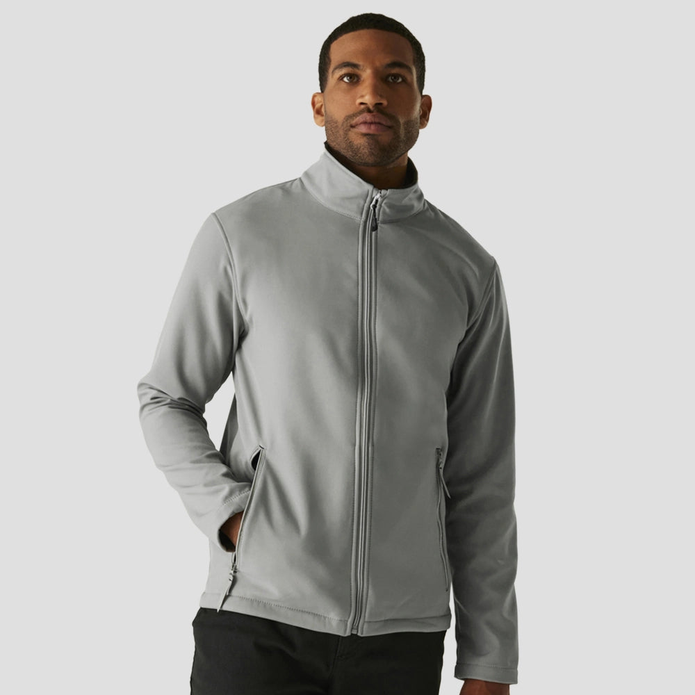 Model wearing the RG371 Regatta Ascender Two Layer Soft Shell Jacket in Mineral Grey
