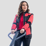 Model wearing the Regatta E-Volve Unisex Thermal Hybrid Jacket in Strong Classic Red/Black