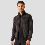 Model wearing RG382 Regatta E-Volve Unisex Knit Effect Midlayer Top in Ash / Black