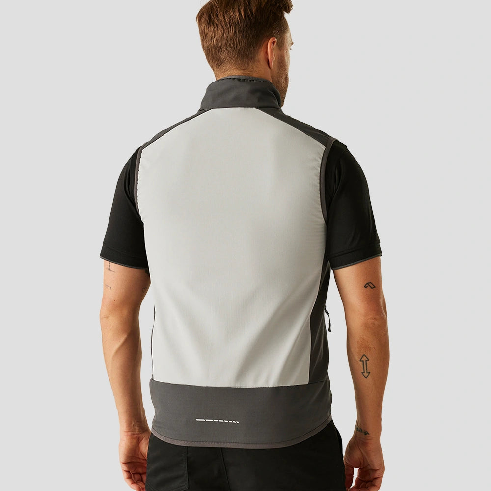 Rear view of model wearing the Regatta E-Volve Unisex Two Layer Soft Shell Bodywarmer in Mineral Grey / Black