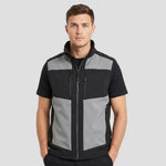Model wearing the Regatta E-Volve Unisex Two Layer Soft Shell Bodywarmer in Mineral Grey / Black