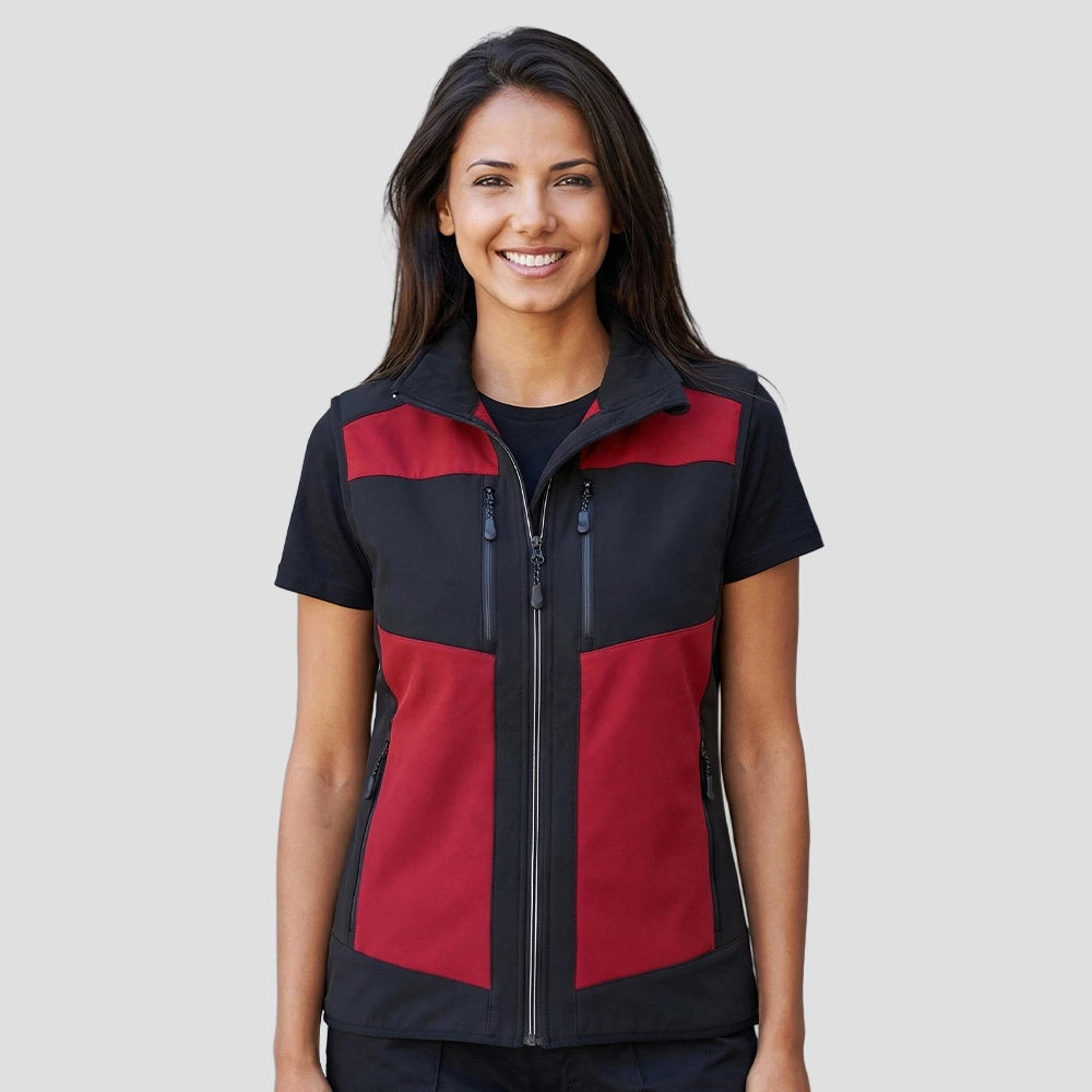 Model wearing the Regatta E-Volve Unisex Two Layer Soft Shell Bodywarmer in Classic Red / Black