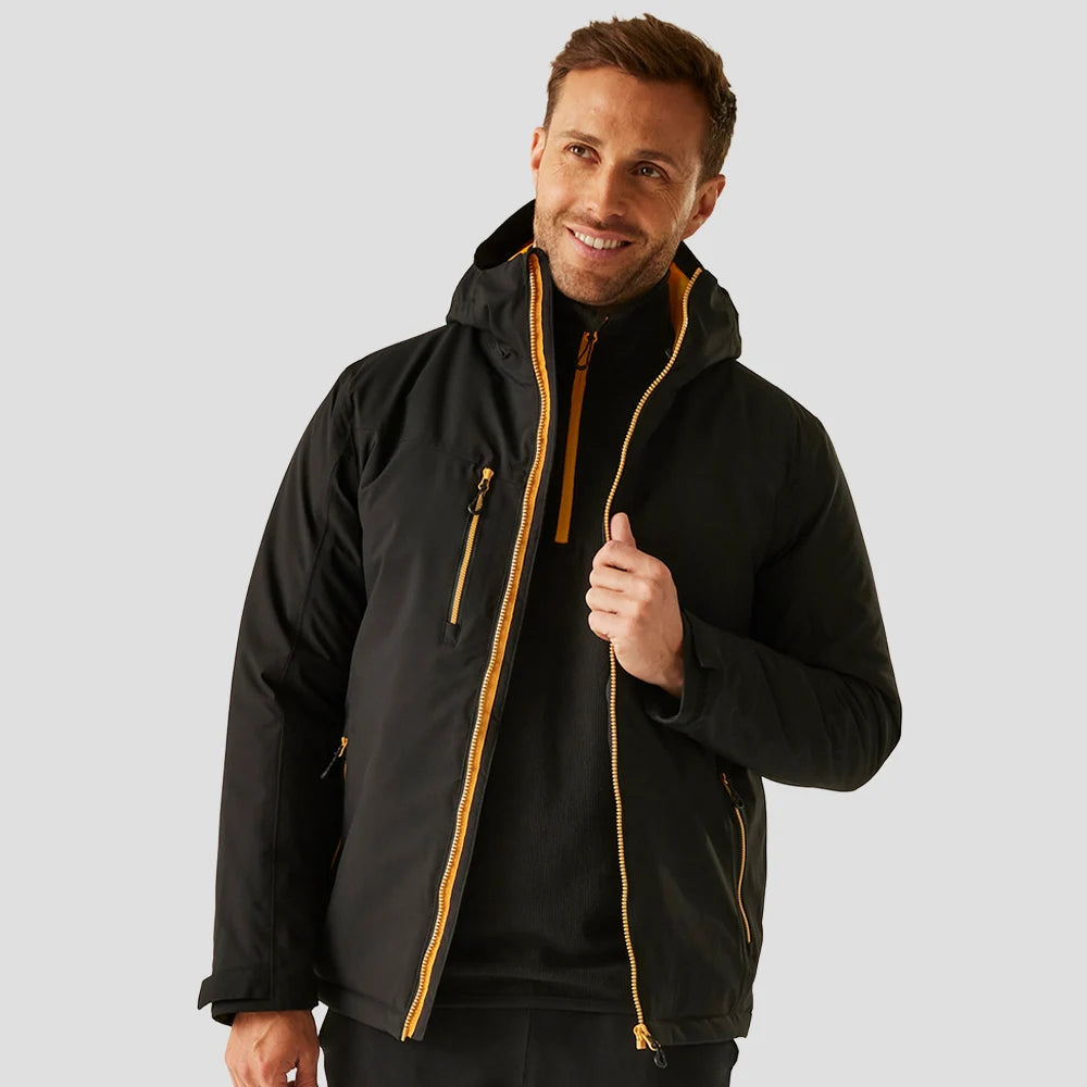 Model wearing the RG443 Regatta Navigate Waterproof Insulated Jacket in Black / Orange Pop