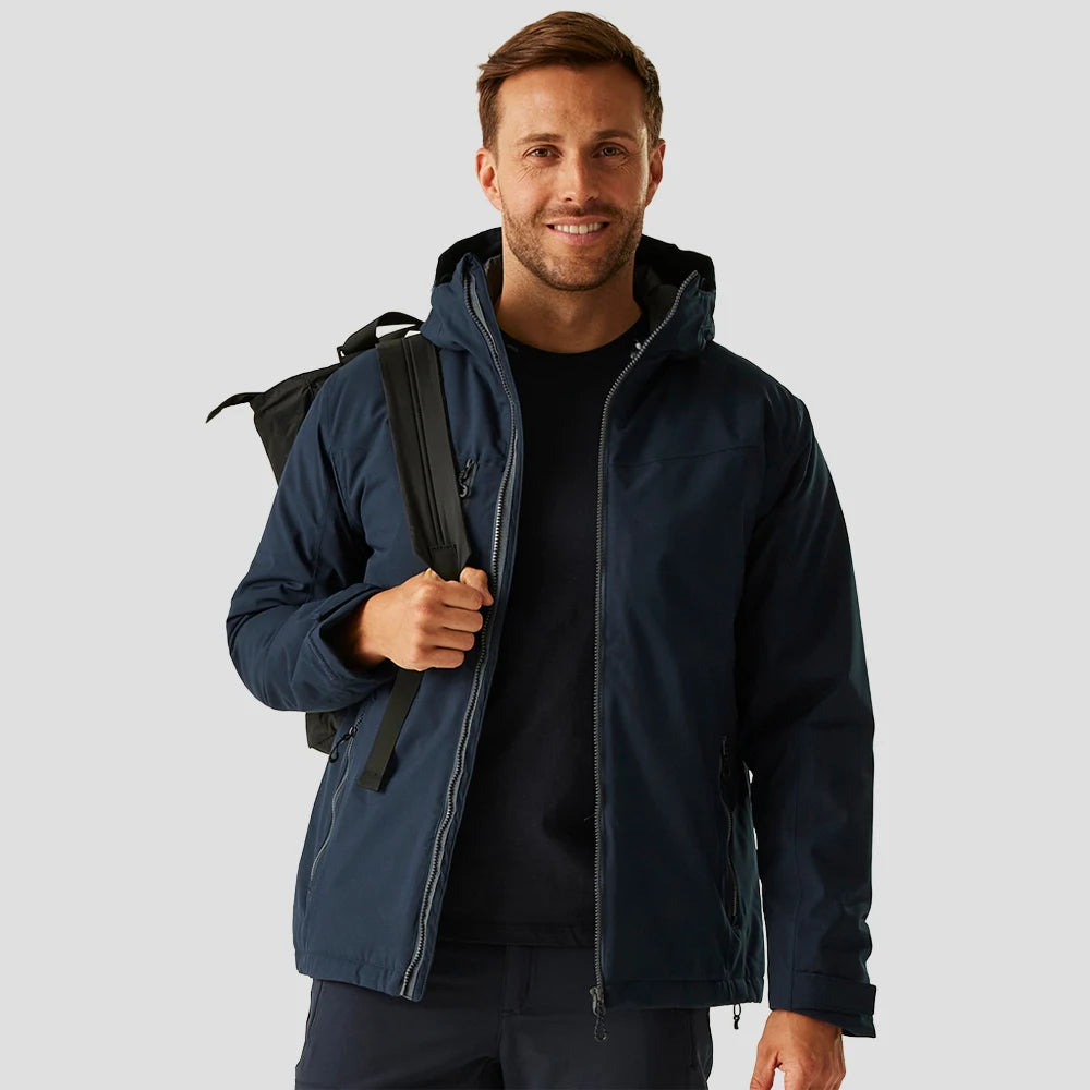 Model wearing the RG443 Regatta Navigate Waterproof Insulated Jacket in Navy / Seal Grey
