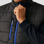 Close-up shot of model wearing the Regatta Navigate Thermal Bodywarmer in Black / New Royal Blue