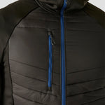 Model wearing the RG446 Regatta Navigate Hybrid Jacket in Black / New Royal Close-up Zip view