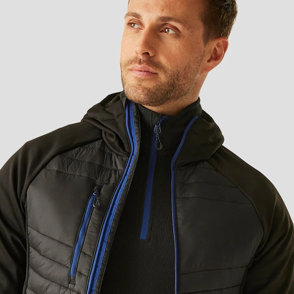 Close-up of model wearing the RG446 Regatta Navigate Hybrid Jacket in Black /  New Royal