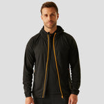 Model wearing the RG451 Regatta Navigate Full Zip Hooded Fleece Jacket in Black / Orange Pop
