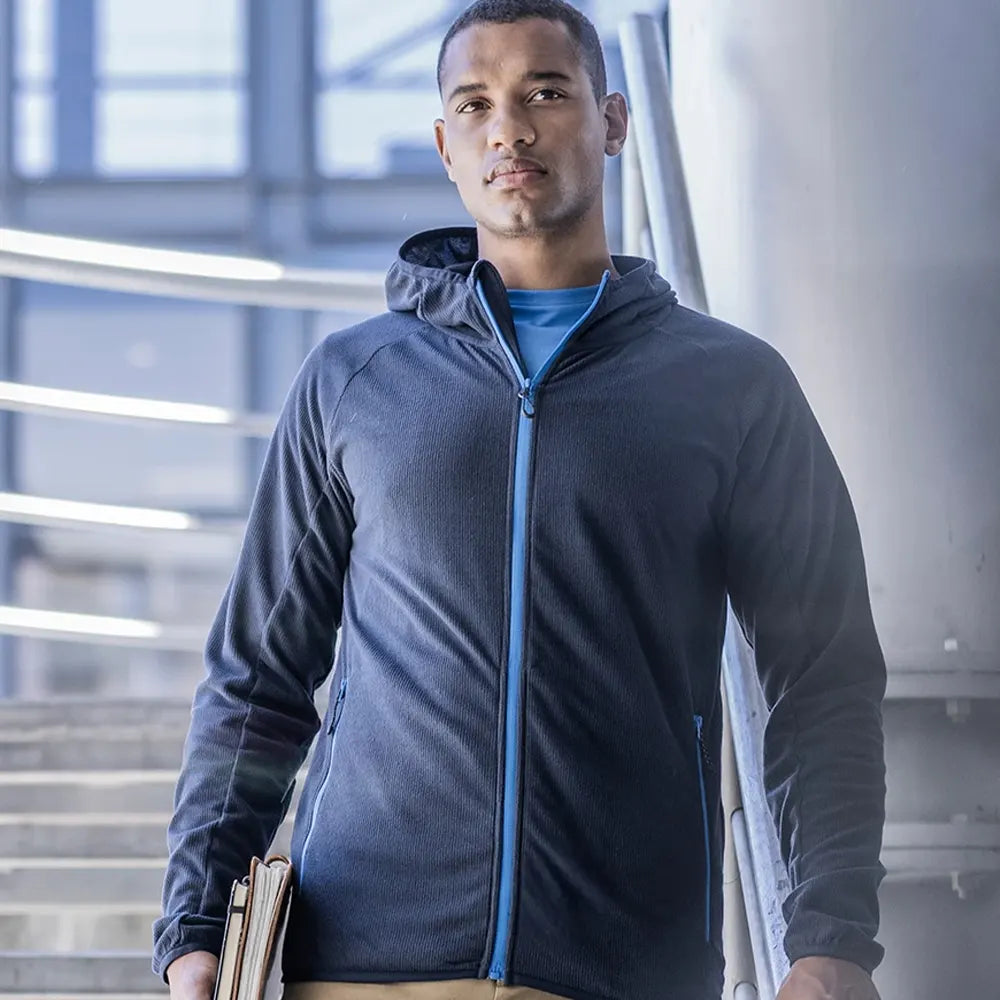 Model wearing the RG451 Regatta Navigate Full Zip Hooded Fleece Jacket in Navy / French Blue