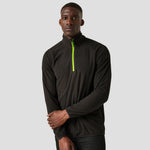 Model wearing the Regatta Navigate Half Zip Fleece RG452 in Black / Lime Green