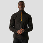 Model wearing the Regatta Navigate Half Zip Fleece RG452 in Black / Orange