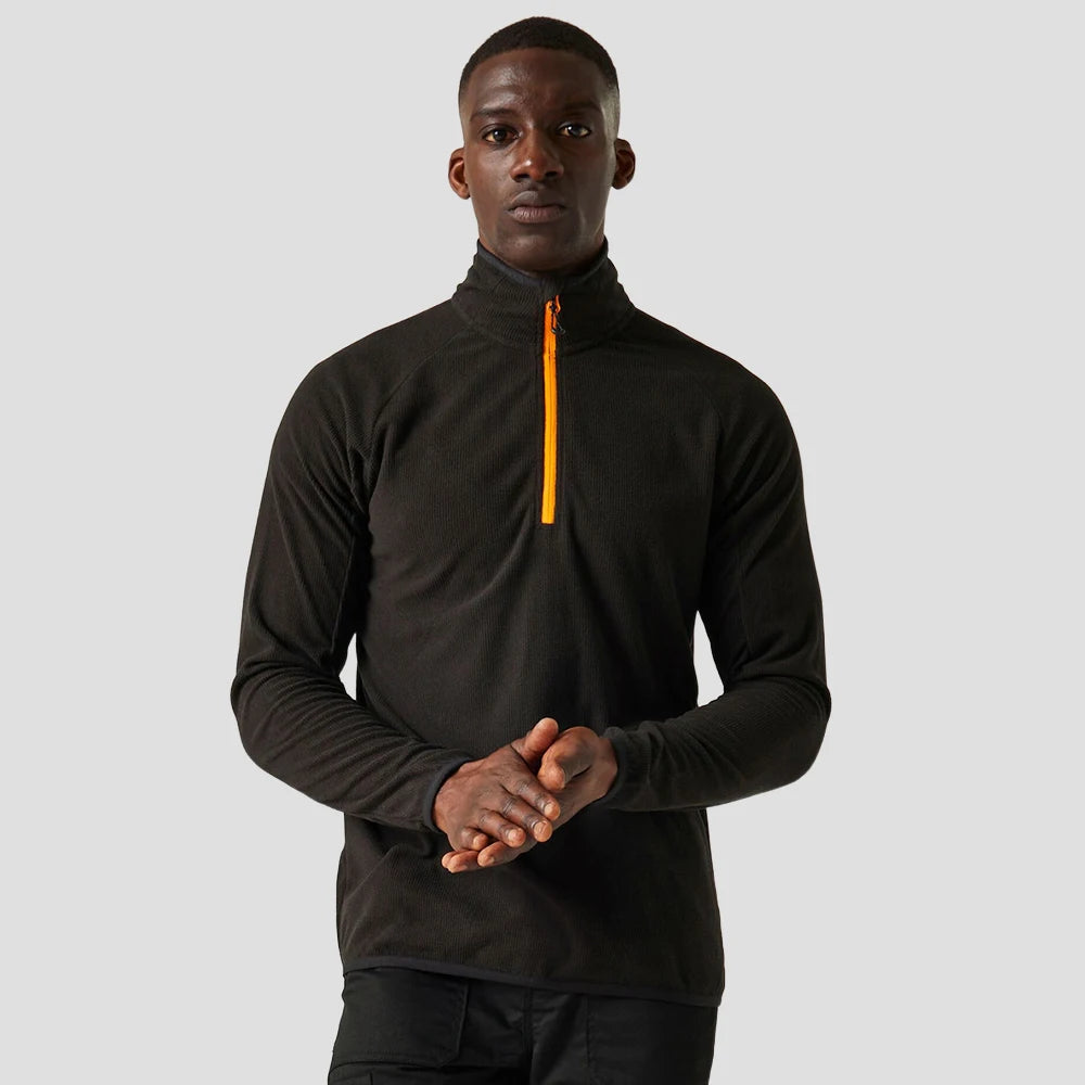Model wearing the Regatta Navigate Half Zip Fleece RG452 in Black / Orange