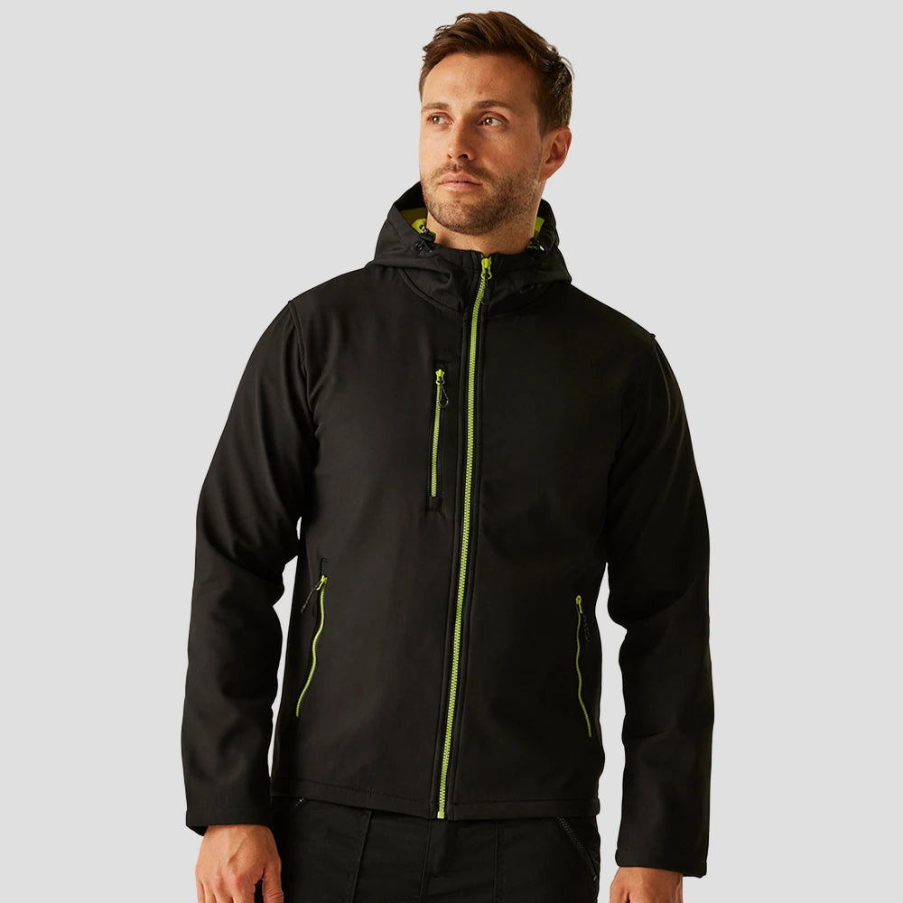 Model wearing the Regatta Navigate Two Layer Hooded Soft Shell Jacket RG454 in Black / Lime Green
