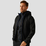 Model wearing the Regatta Navigate Two Layer Hooded Soft Shell Jacket RG454 in Black / New Royal Blue