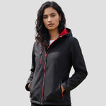 Model wearing the Regatta Navigate Two Layer Hooded Soft Shell Jacket RG454 in Black / Classic Red