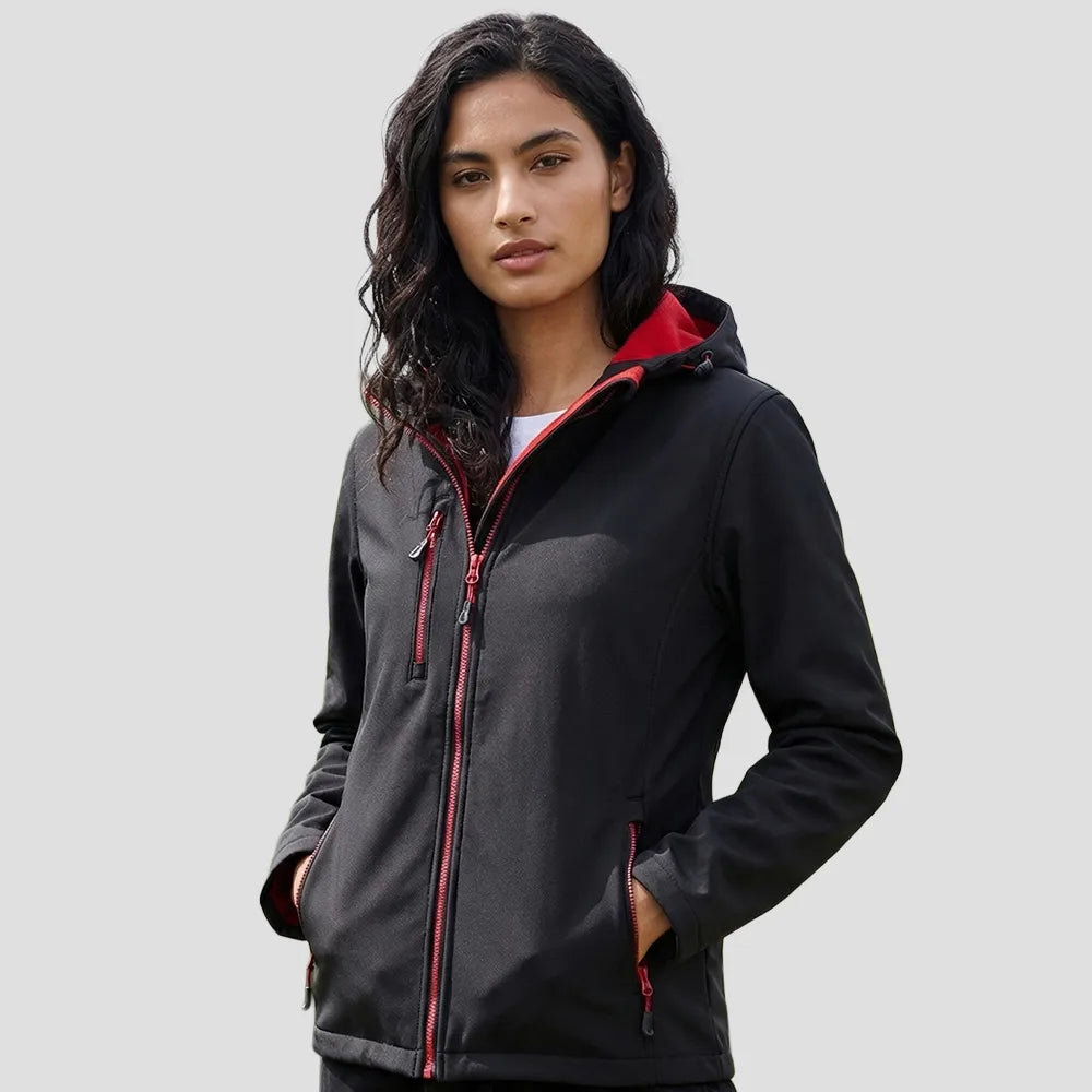 Model wearing the Regatta Navigate Two Layer Hooded Soft Shell Jacket RG454 in Black / Classic Red